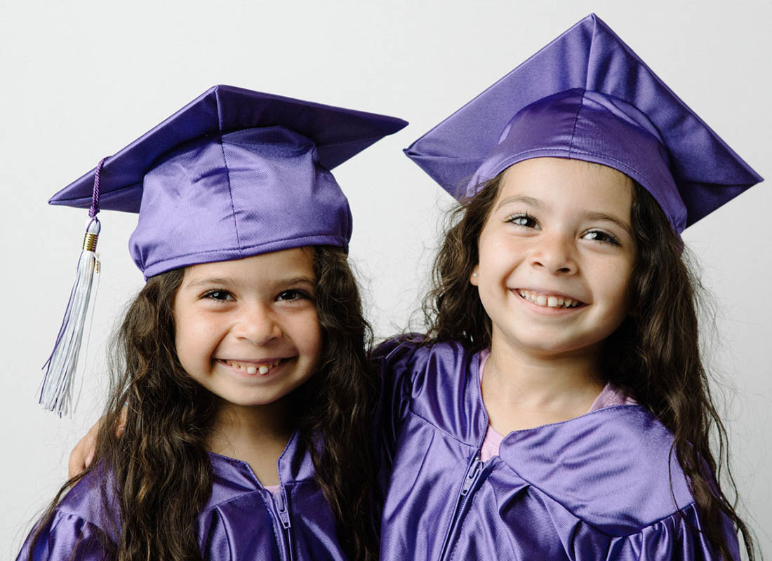 Our twins smile as they were surprised by a family graduation parade