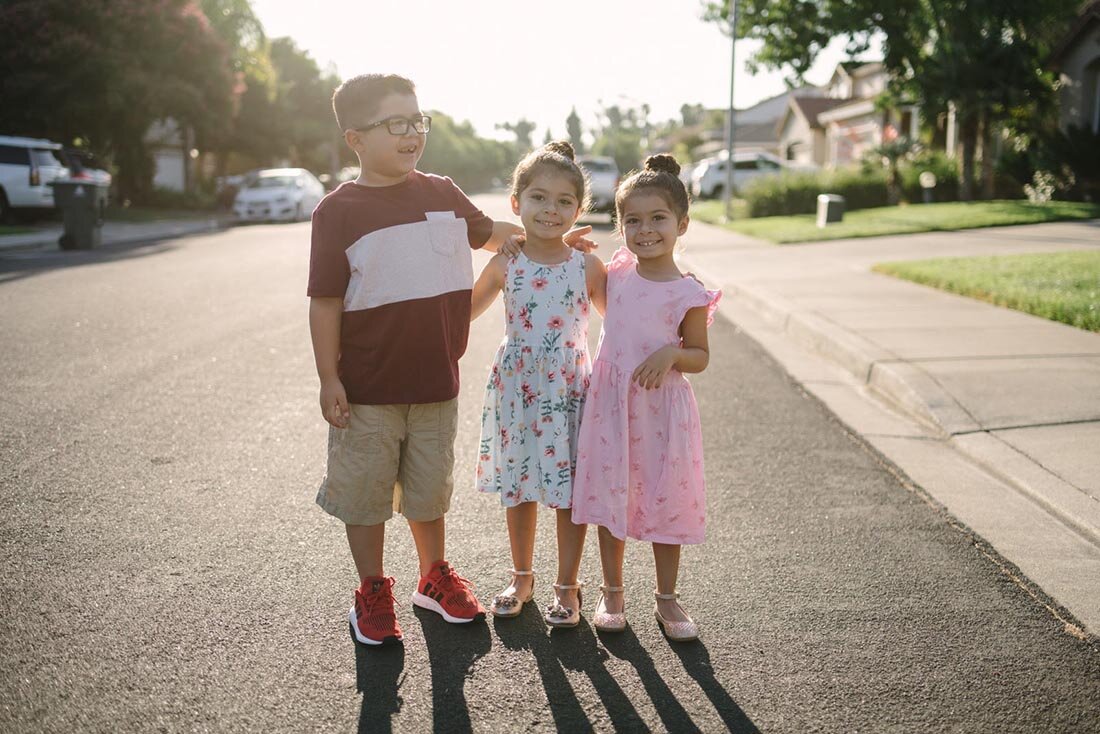 Kids in the early morning sun, happy and excited