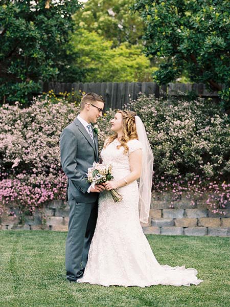 Bride and Groom staring lovingly at one another on their wedding day