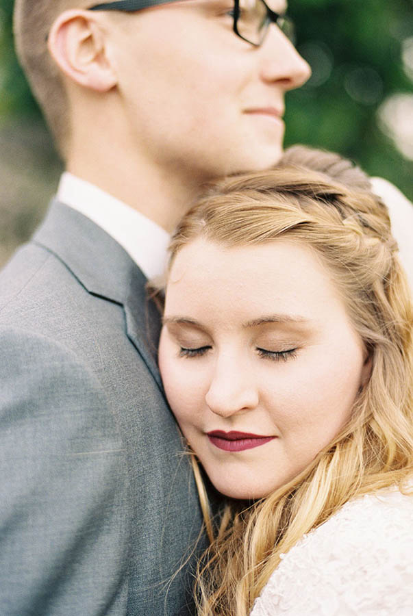 Couple share a loving embrace after their wedding, photo shot on film in Vacaville CA